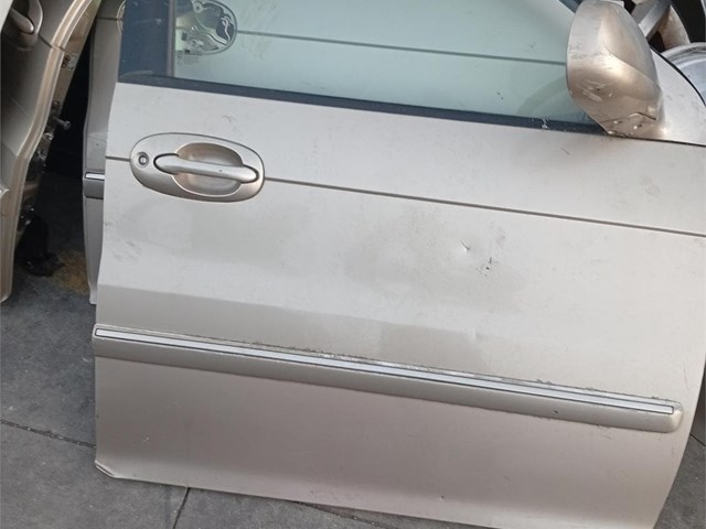 puerta delantera derecha kia carnival